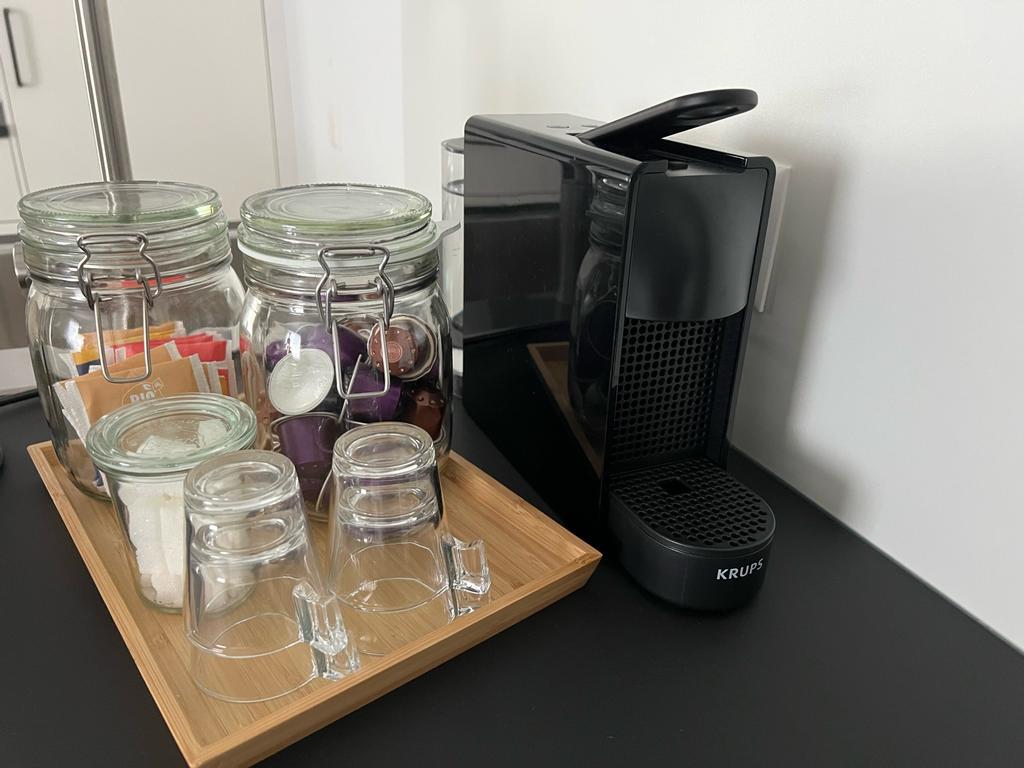 Coffee corner with coffee capsules and tea