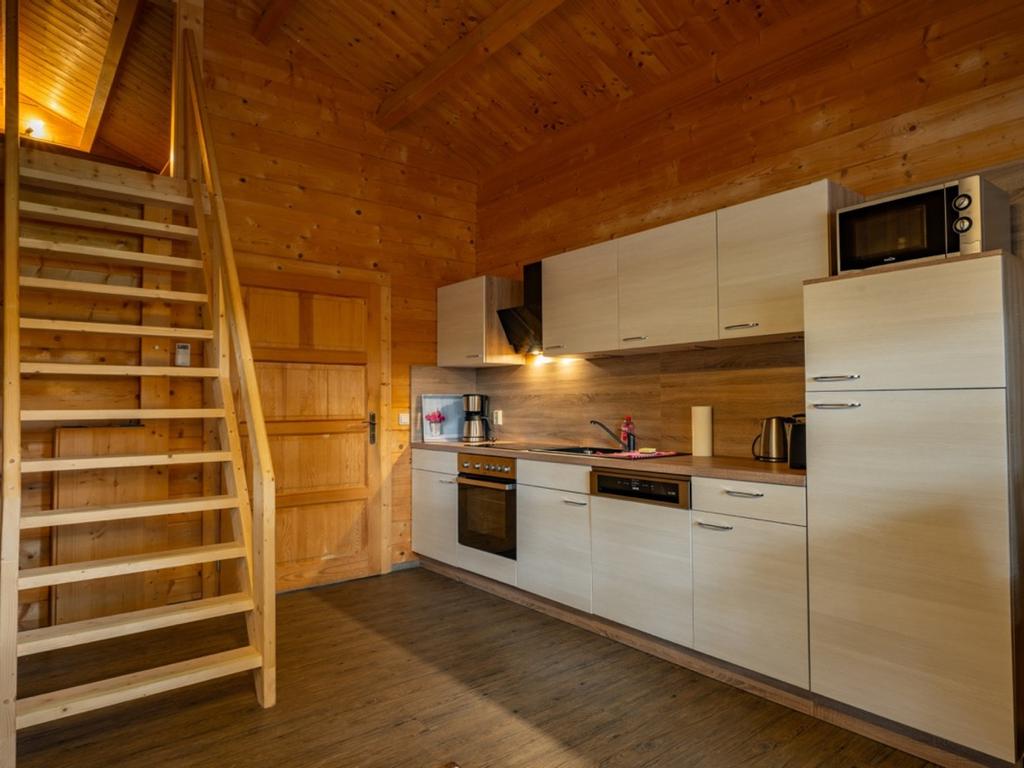 Fitted kitchen with dining area