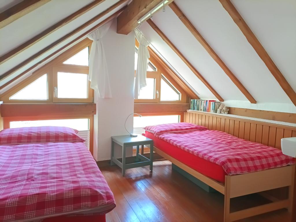 main sleeping room with 2 single beds